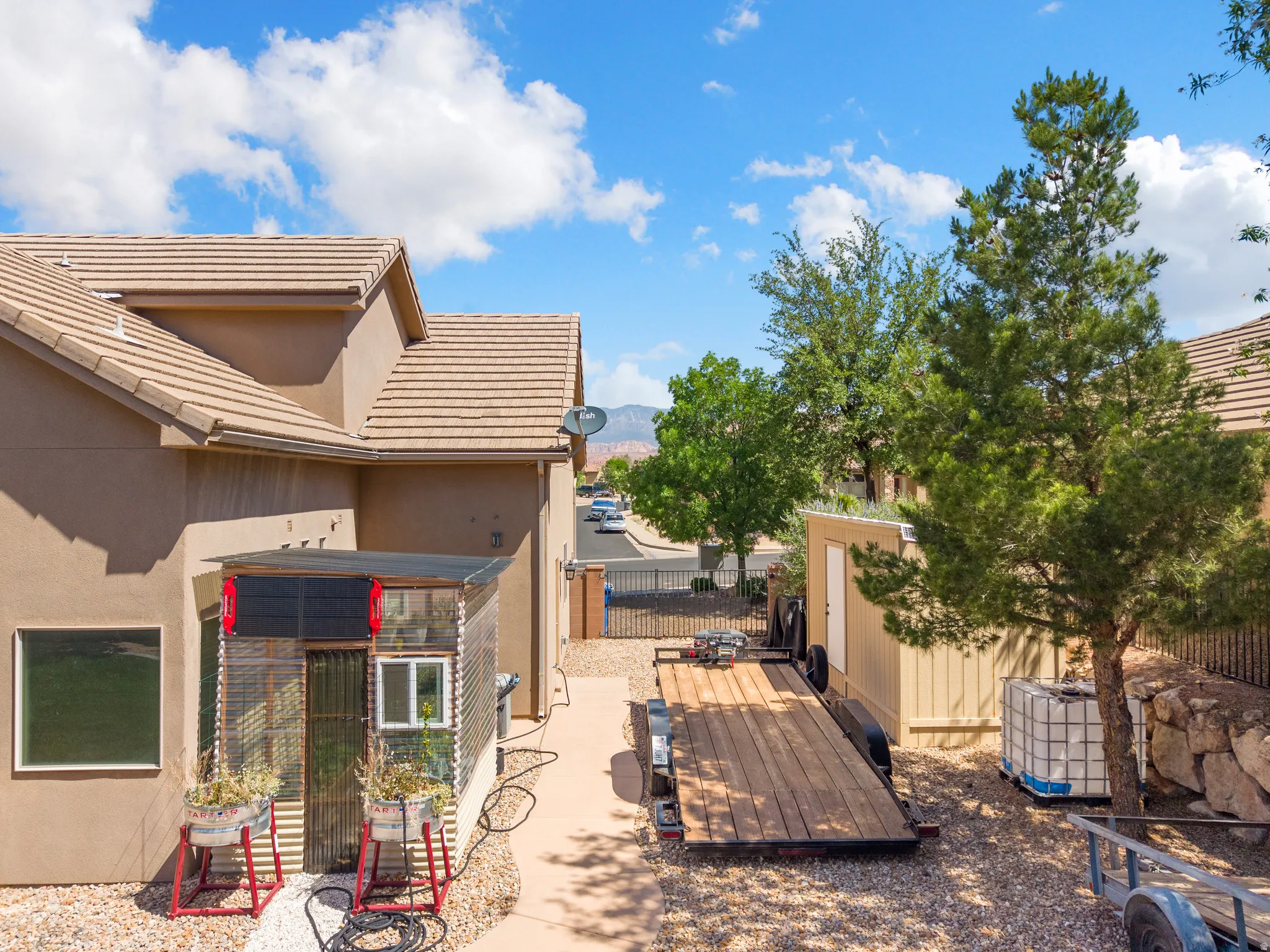 Exterior of the property featuring a stucco finish and a tile roof