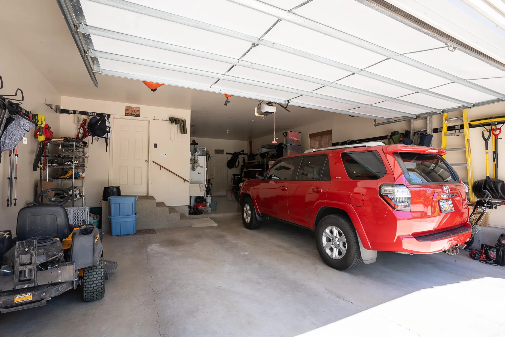 Two-car plus garage is insulated and painted. The work bench stays, with great space for all the little toys!