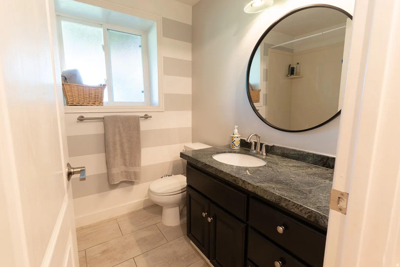 Up dated basement full bathroom.  Granite and tile AND this is a steam shower !
