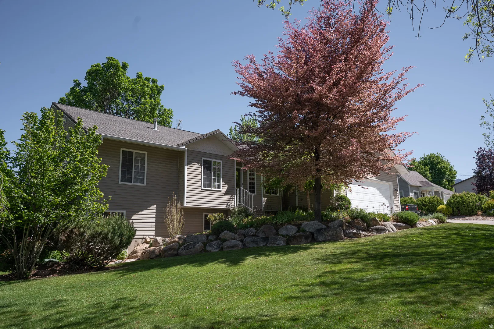 Fully landscaped and well maintained. This is the perfect setting for animals, gardening, and spending time at home!