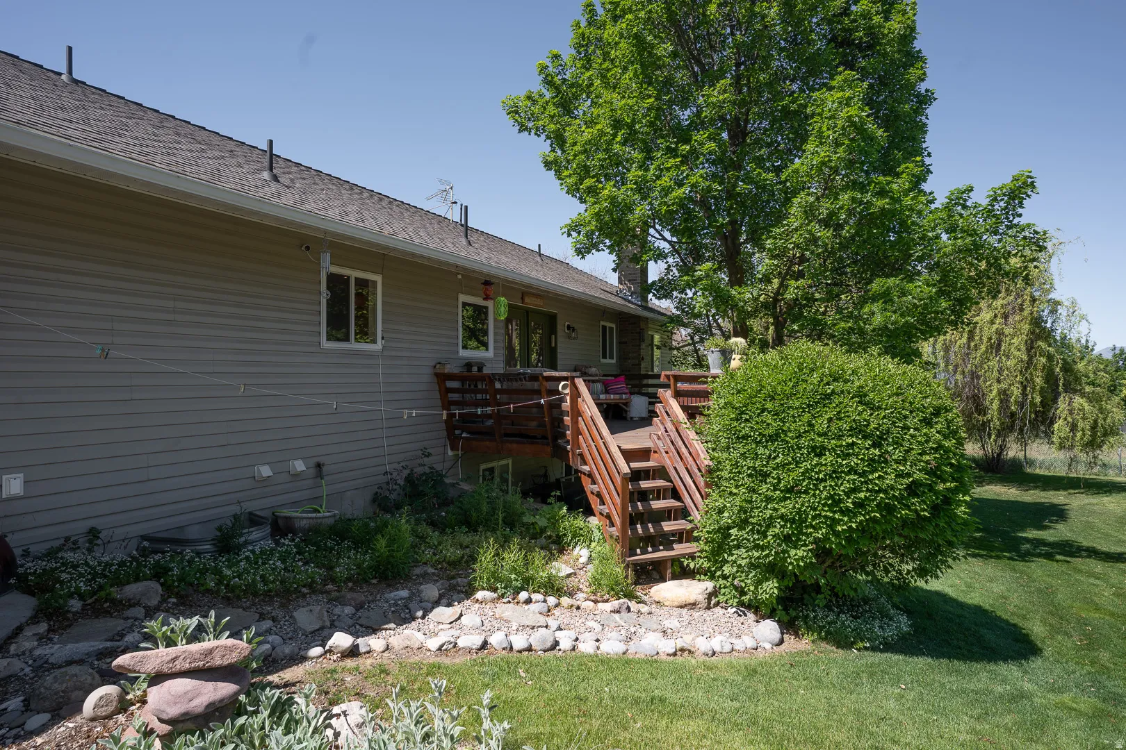 This sturdy back deck has been stained every other year !  IT's in great shape !