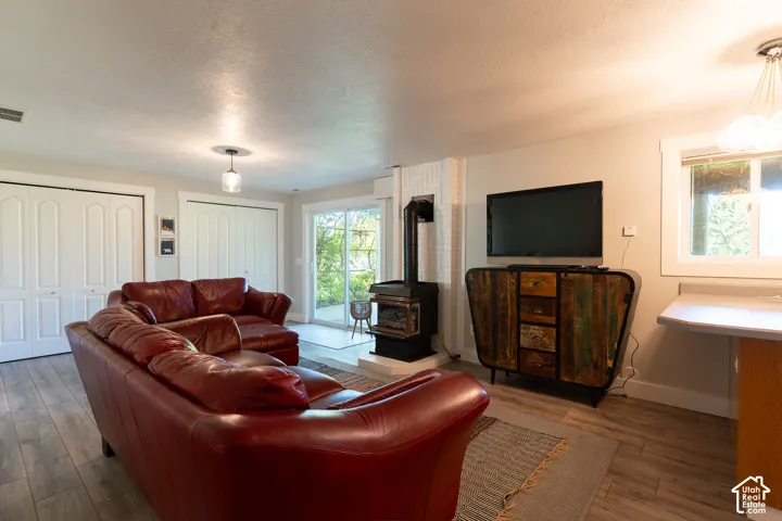 Family room with a walk out, double closets for storage.  You'll keep warm with the gas fireplace, and enjoy the wet bar if needed.