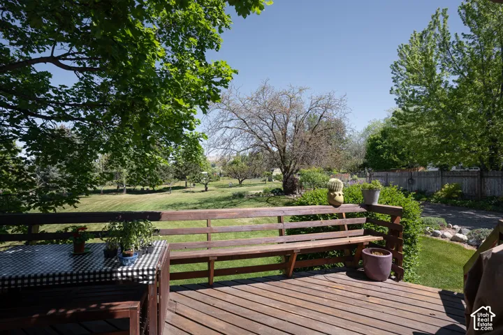 Large and sturdy  back deck off the dining area, walk to the back yard, or sit and enjoy the sun, and shade.