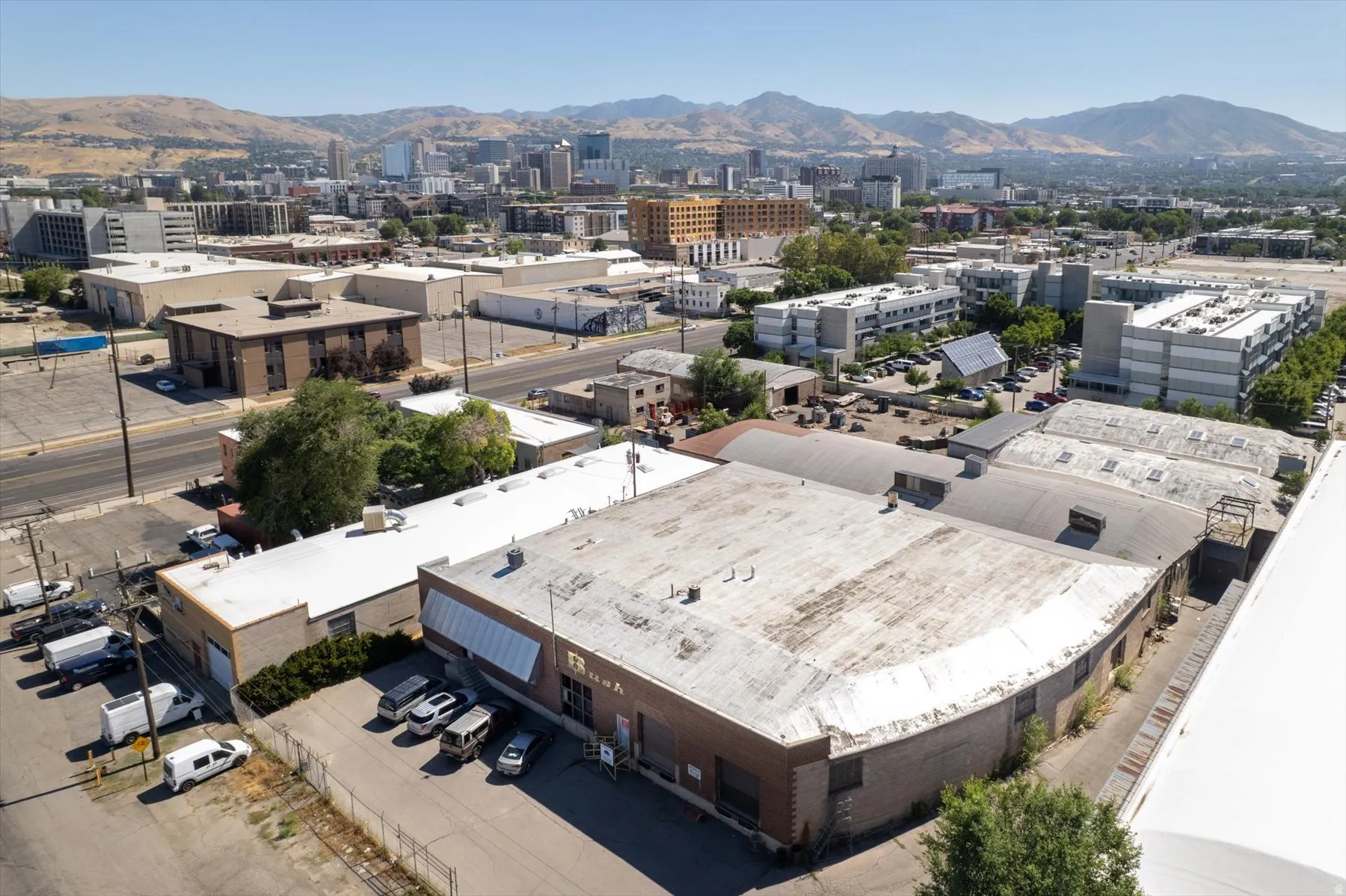 Industrial property with a large, roof and a curved facade