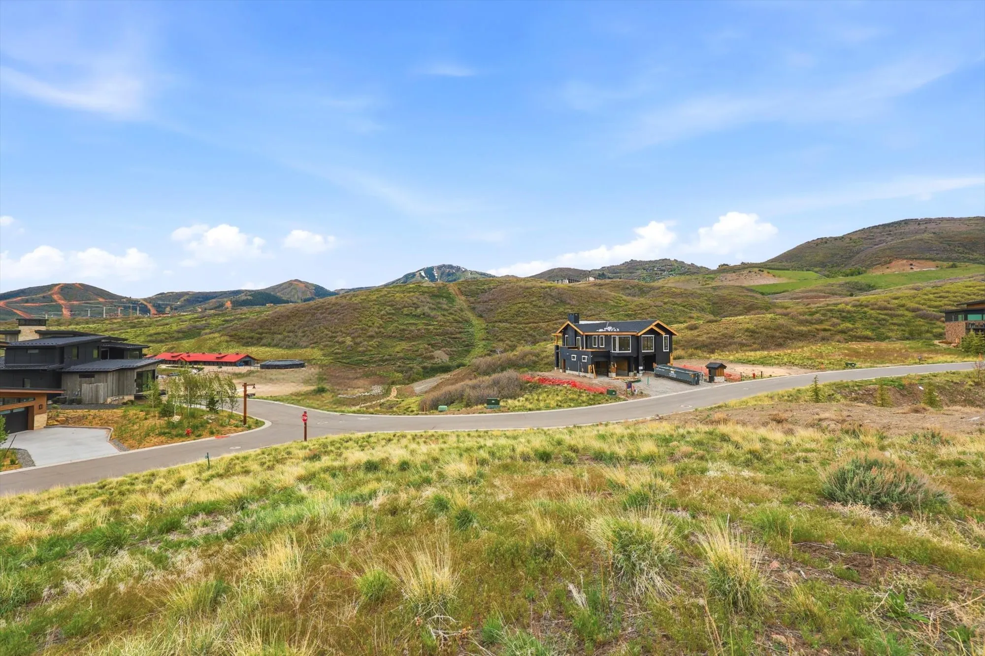 Hillside setting with distant mountainous terrain