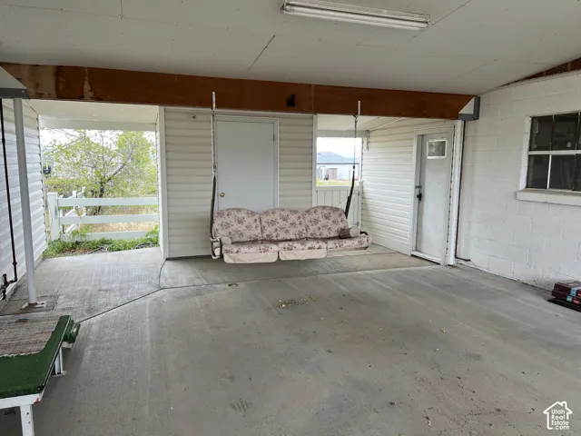 Fun swing in the carport area. Lots of space and parking.
