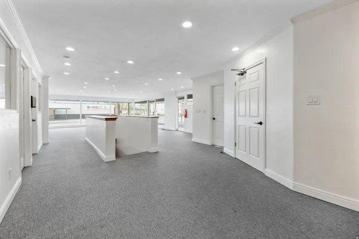 Showroom with stairs leading to the bsmt