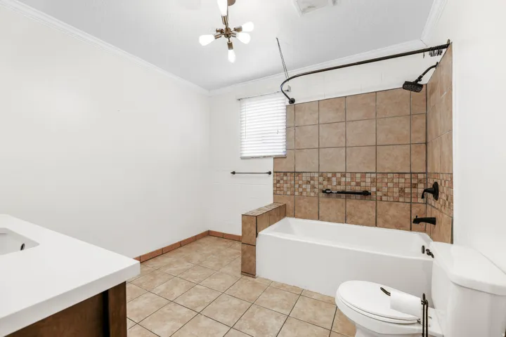 Full bathroom off the 2nd entrance foyer in the South Bldg