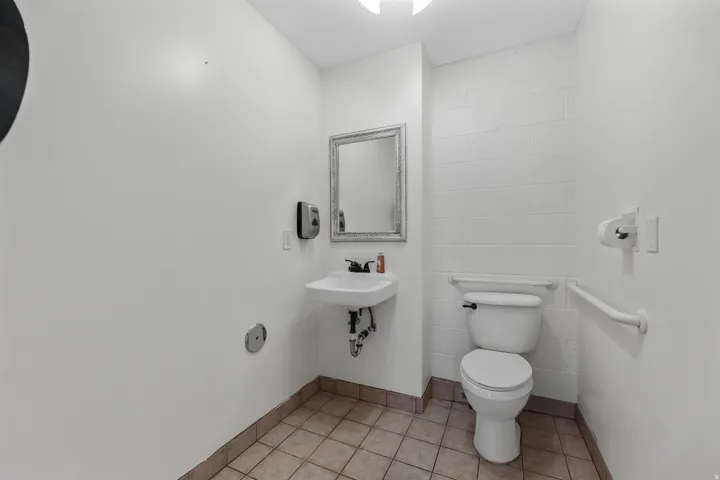 Half bath located in the main showroom area