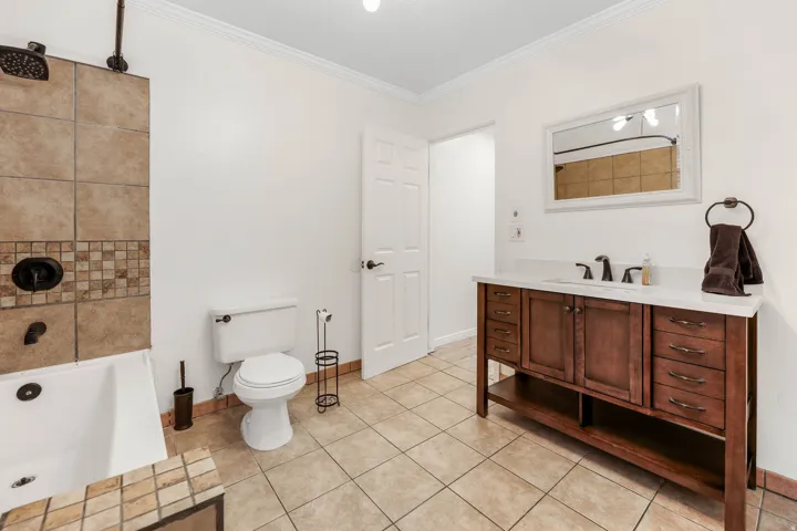 Full bathroom off the 2nd entrance foyer in the South Bldg