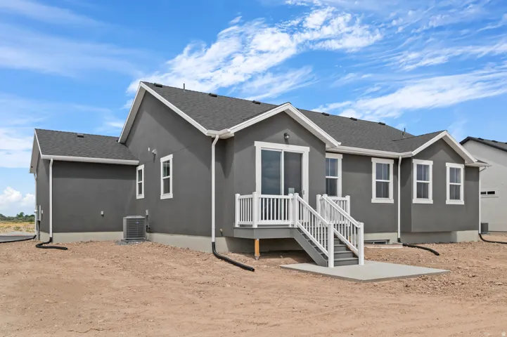 Contemporary stucco exterior with contrasting white trim details
