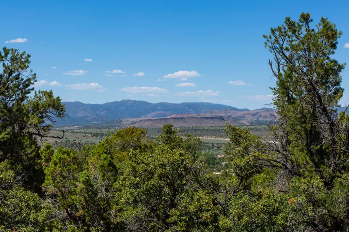 Vast natural landscape featuring distant mountains and expansive sky