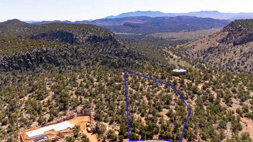 Expansive, undeveloped parcel with a natural, varied terrain