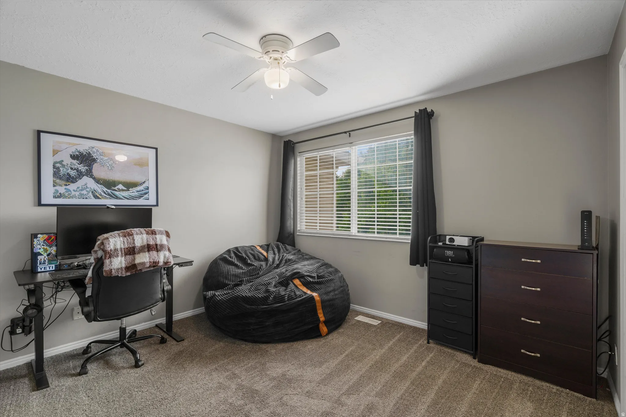 Second bedroom features a walk in closet