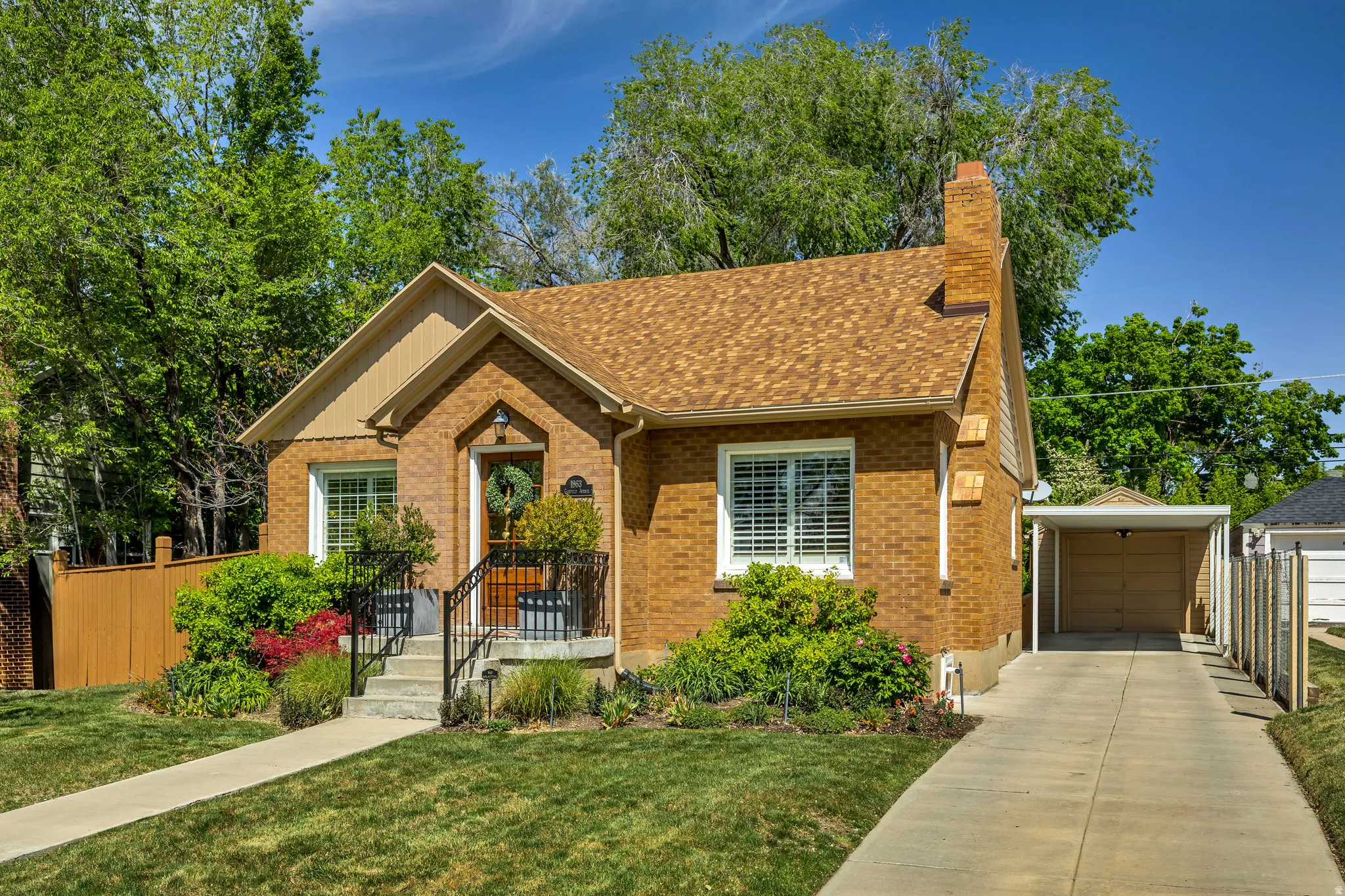 Brick exterior with a gabled roof and front porch