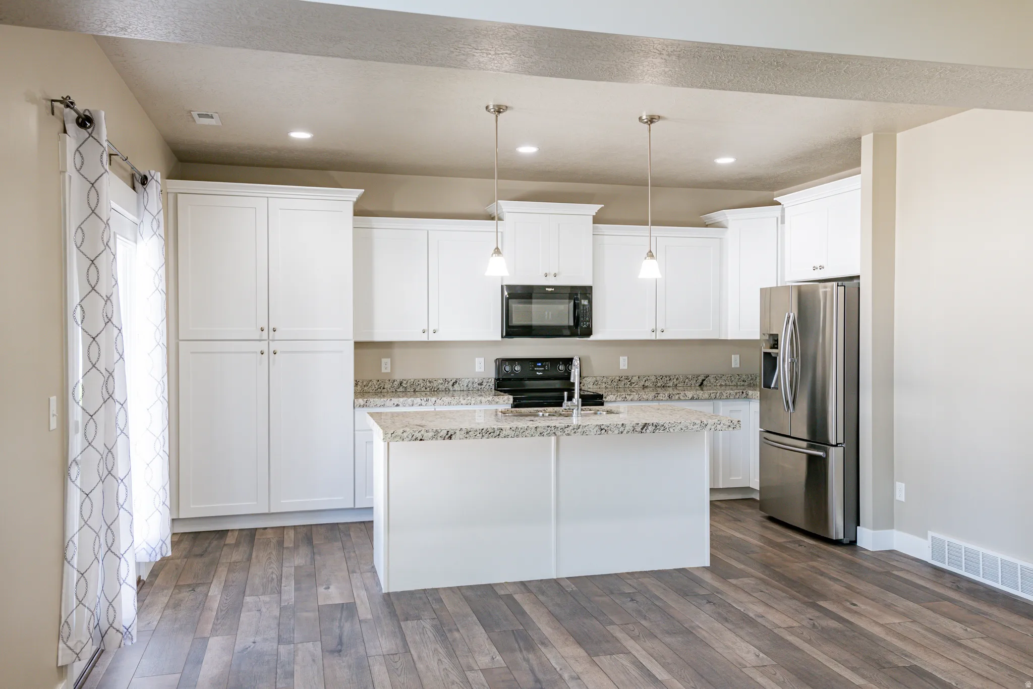 Bright white kitchen—clean, timeless, and functional.