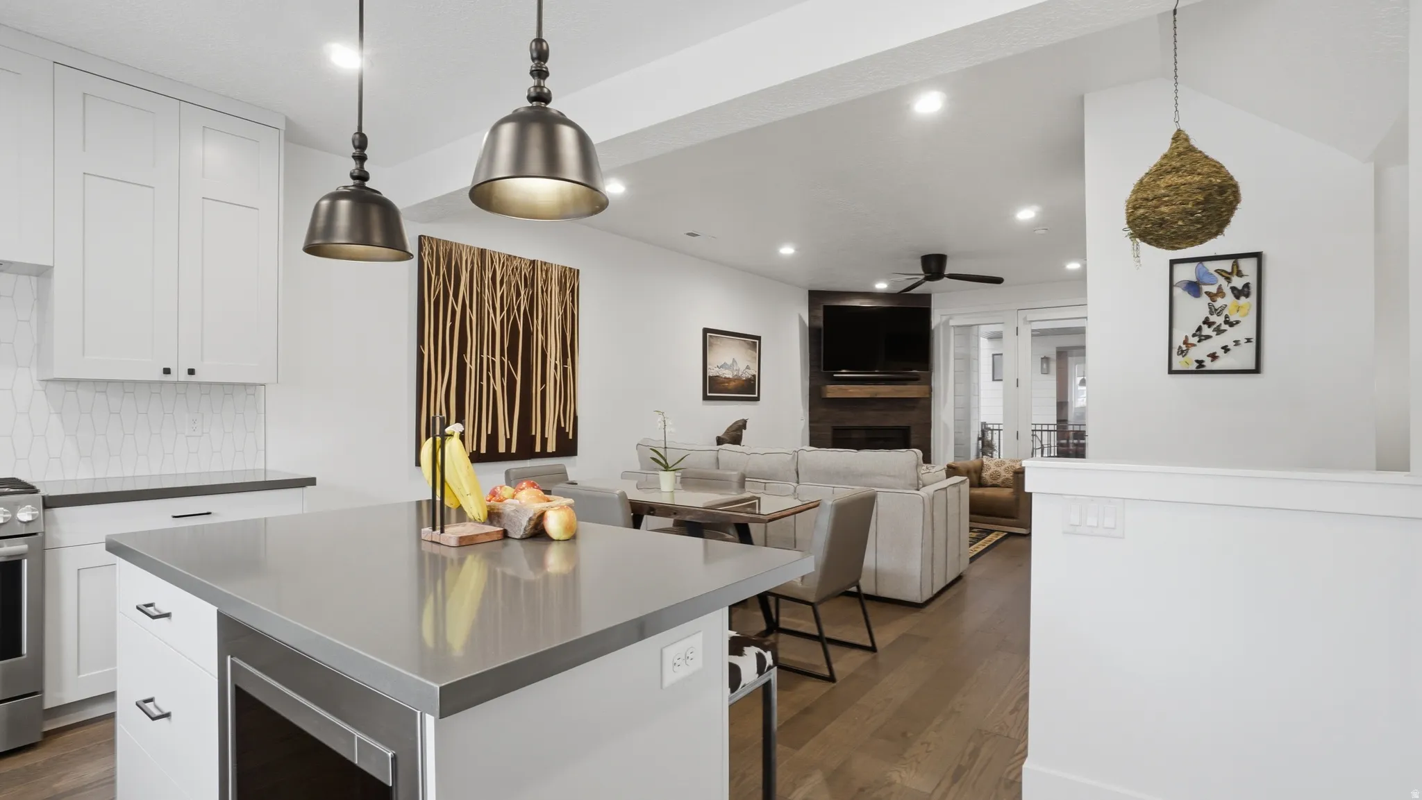 Modern kitchen island with a stone countertop and integrated storage