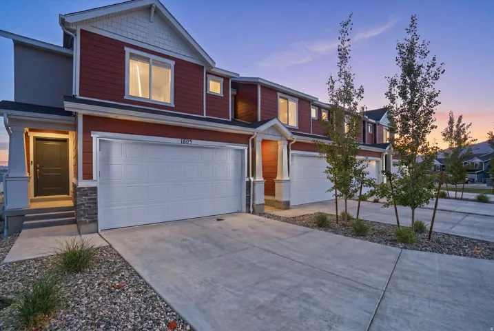 Red siding exterior with white trim details