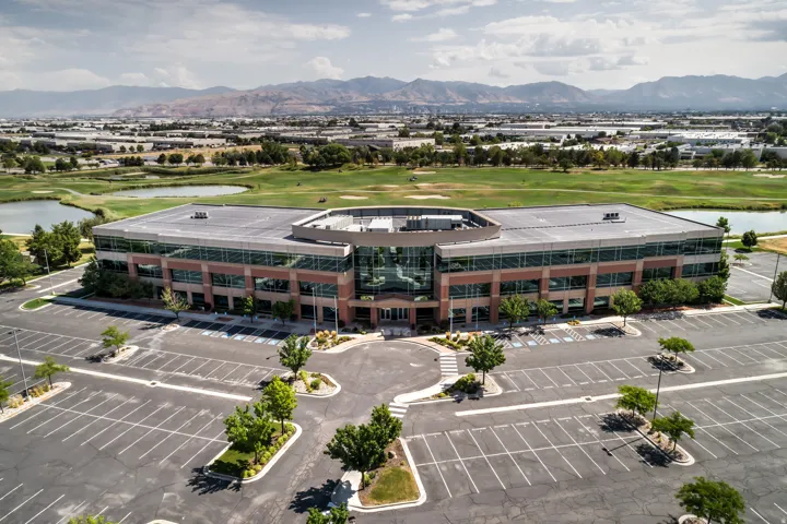 Contemporary commercial building featuring a curved architectural design