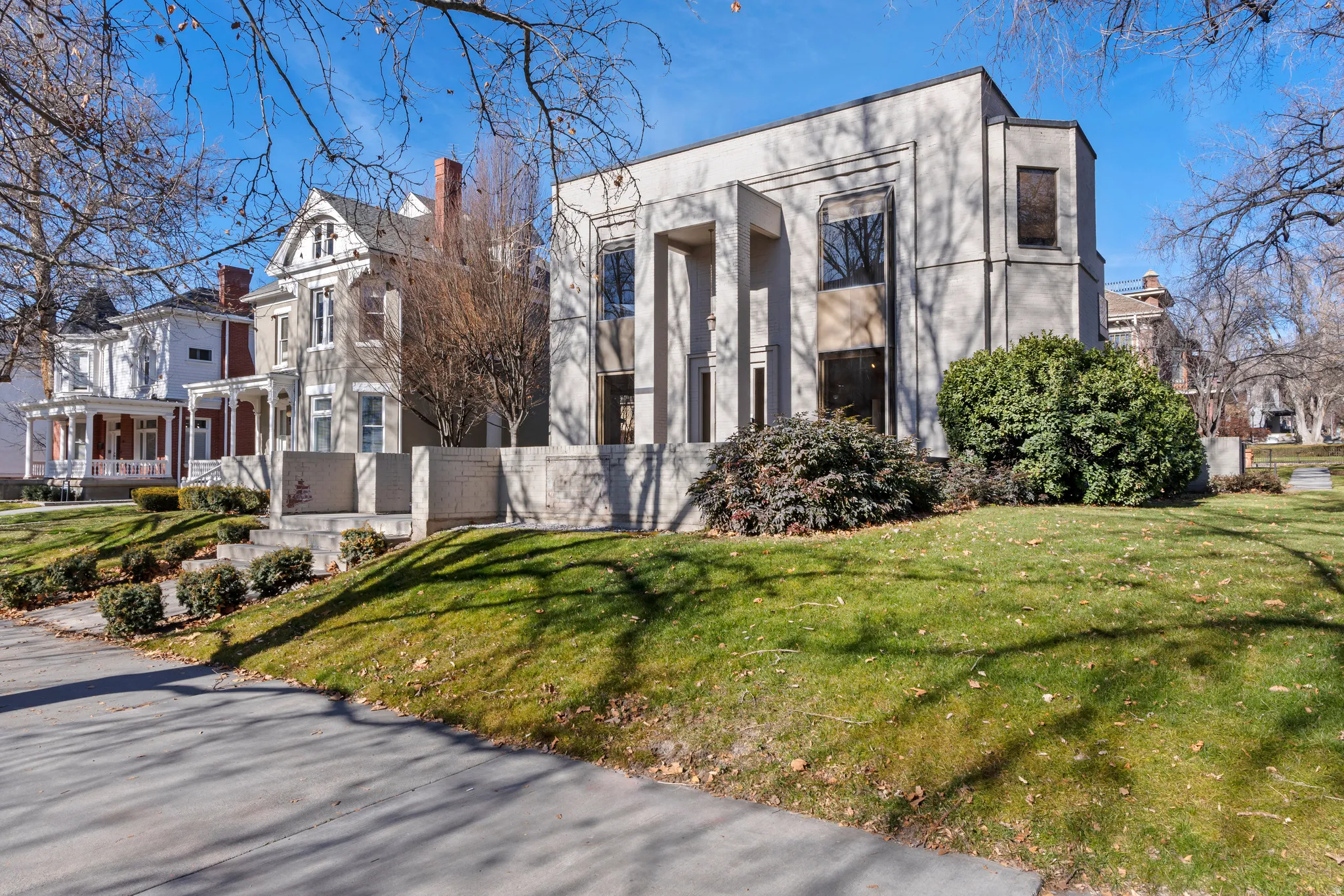 Modern facade with architectural columns and dark-framed windows