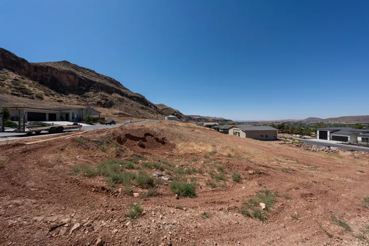 Expansive hillside lot featuring a gradual slope and natural terrain