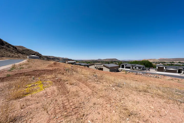Expansive unimproved lot featuring a sloped terrain