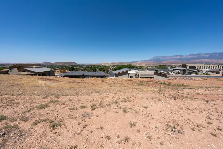 Expansive undeveloped lot featuring a clear horizon and distant mountains