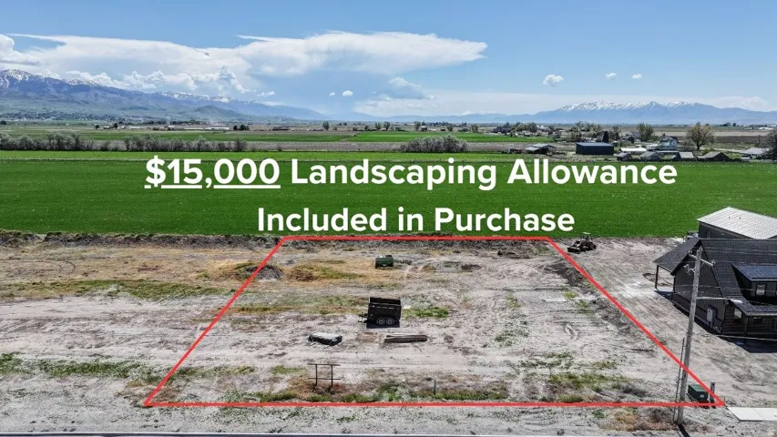 Expansive land parcel featuring a defined boundary, offering open space for development