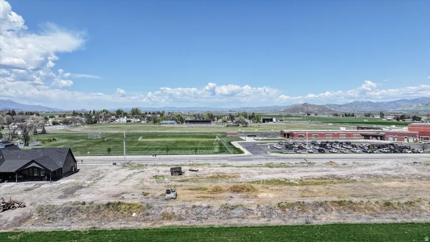 Expansive undeveloped land with a distant mountainous backdrop