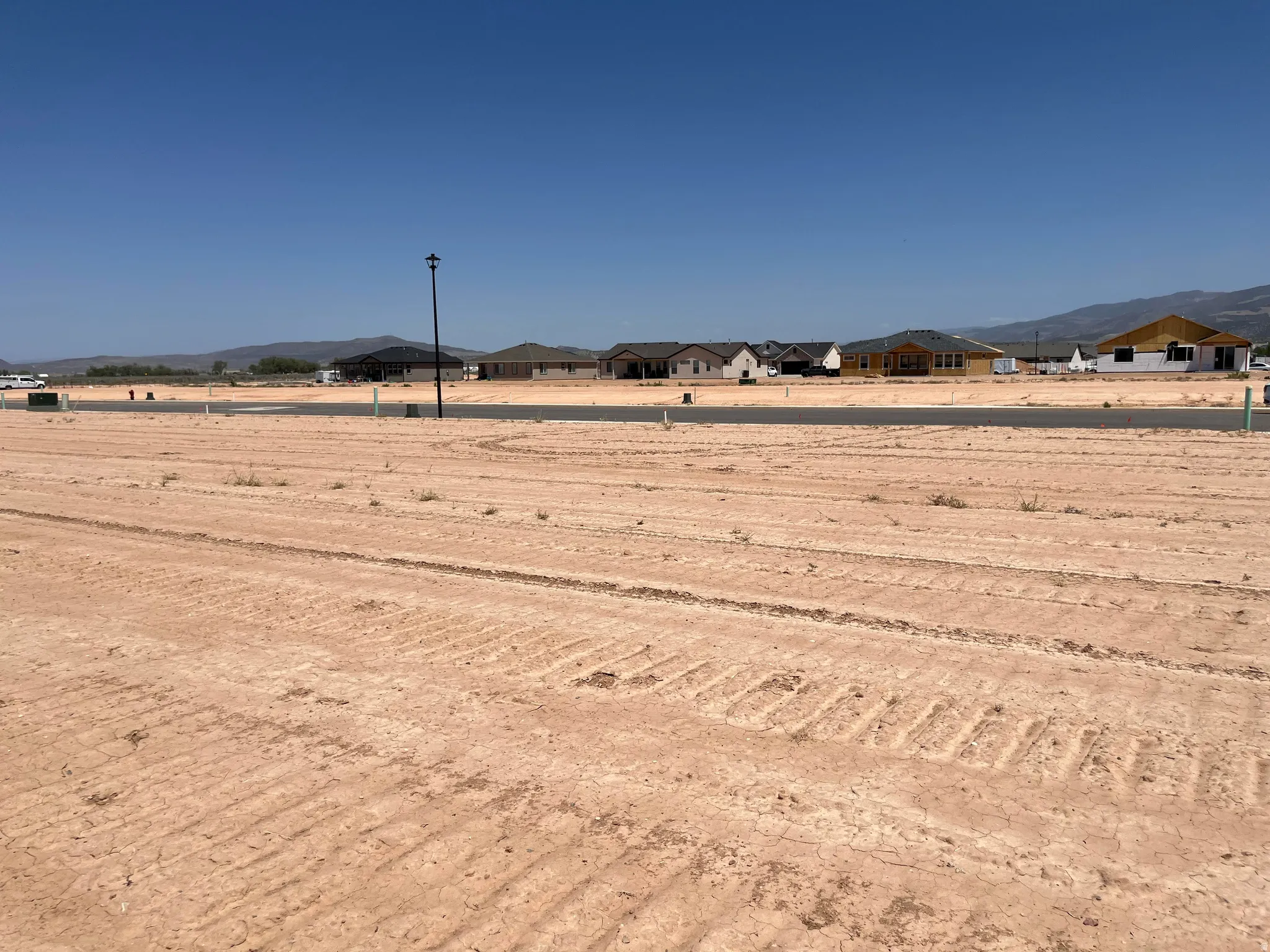 Expansive undeveloped lot with a clear, level terrain