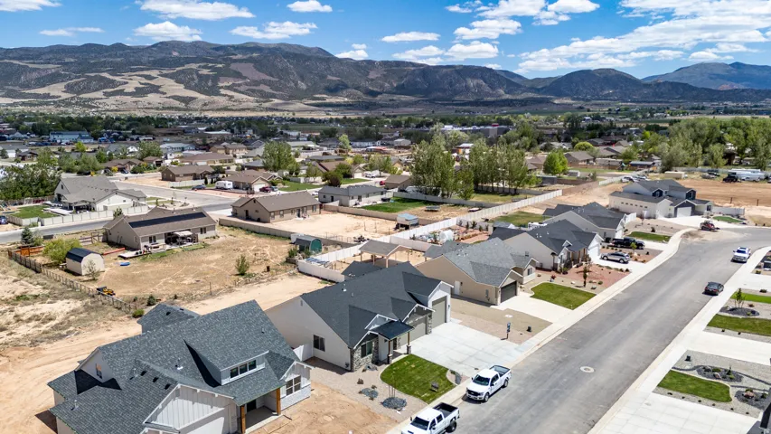 Aerial perspective showcasing a residential street with multiple contemporary homes