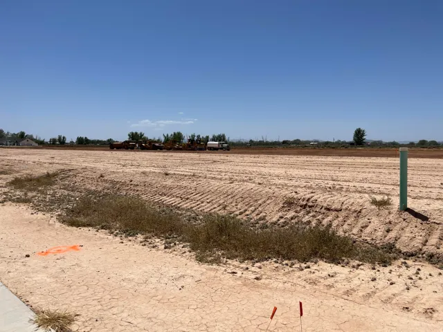 Expansive undeveloped lot with cleared, level ground
