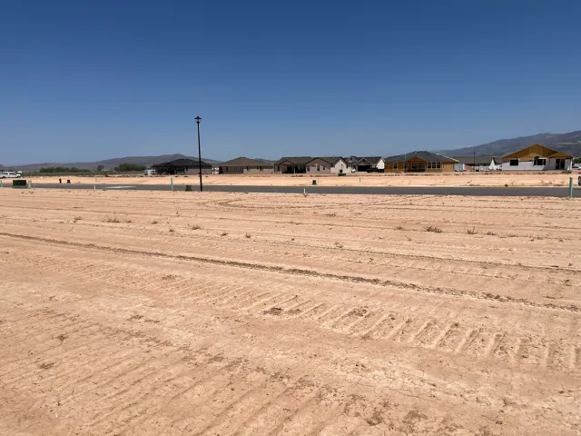 Expansive undeveloped lot with a clear, level terrain