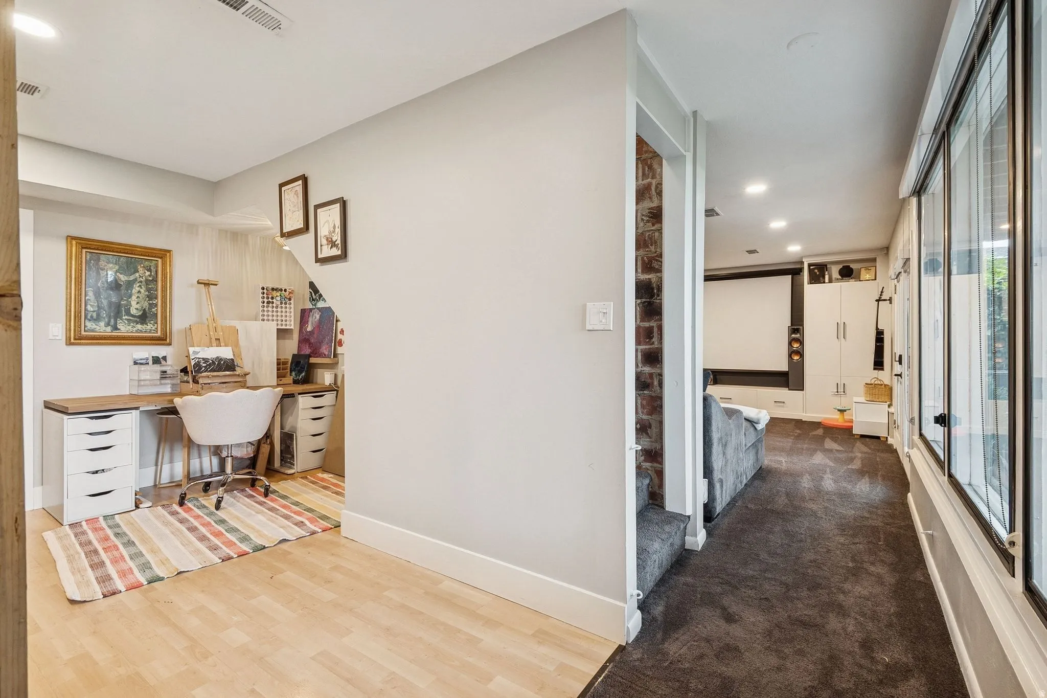 Dedicated workspace featuring wood-finish flooring