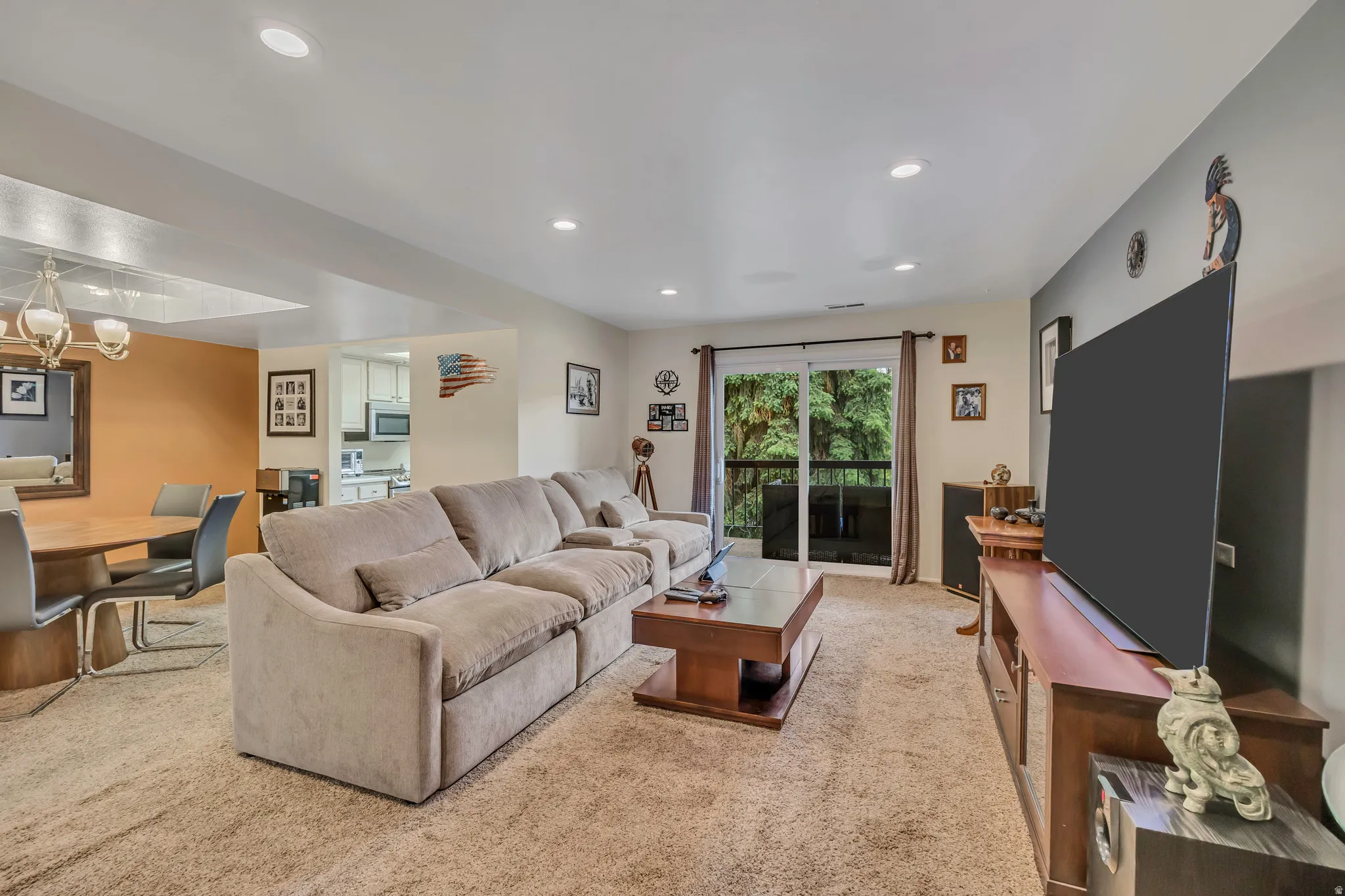 Living Room with Walk Out to Covered Balcony