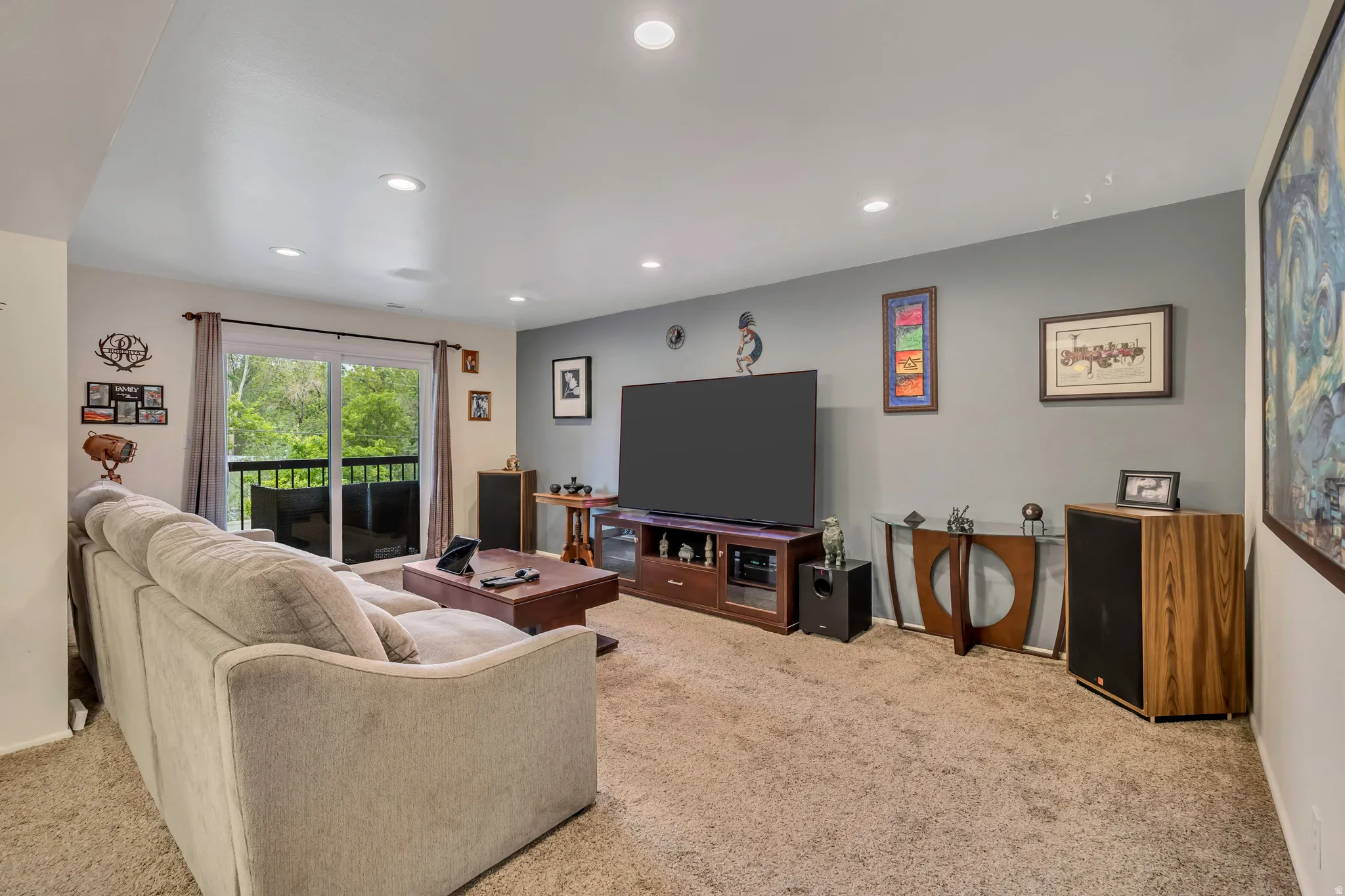Living Room with Walk Out to Covered Balcony.