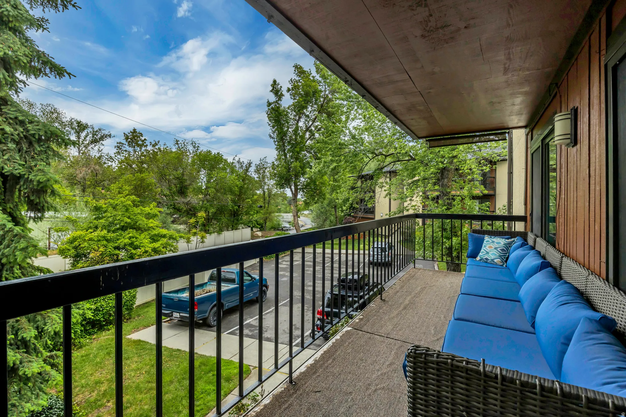Balcony overlooking quiet treelined street