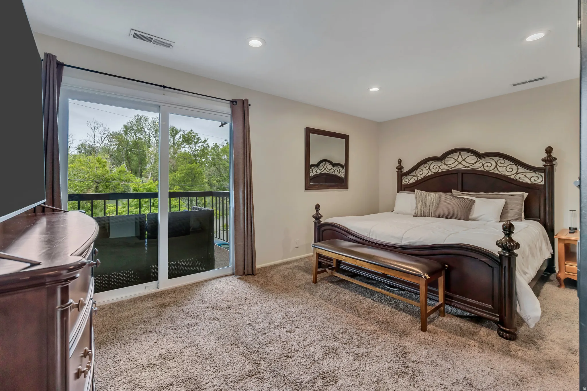 Large Primary Bedroom with Walkout to Covered Balcony
