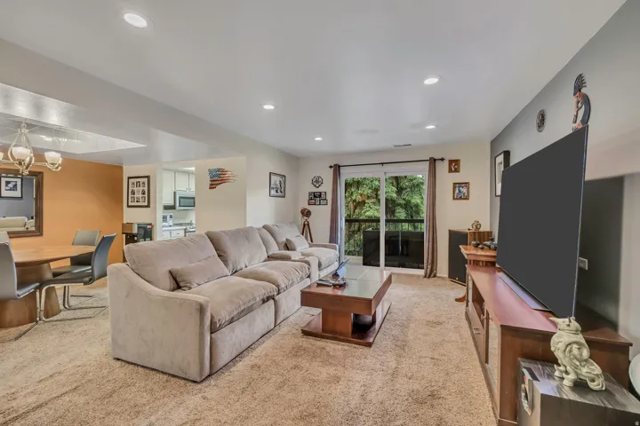 Living Room with Walk Out to Covered Balcony