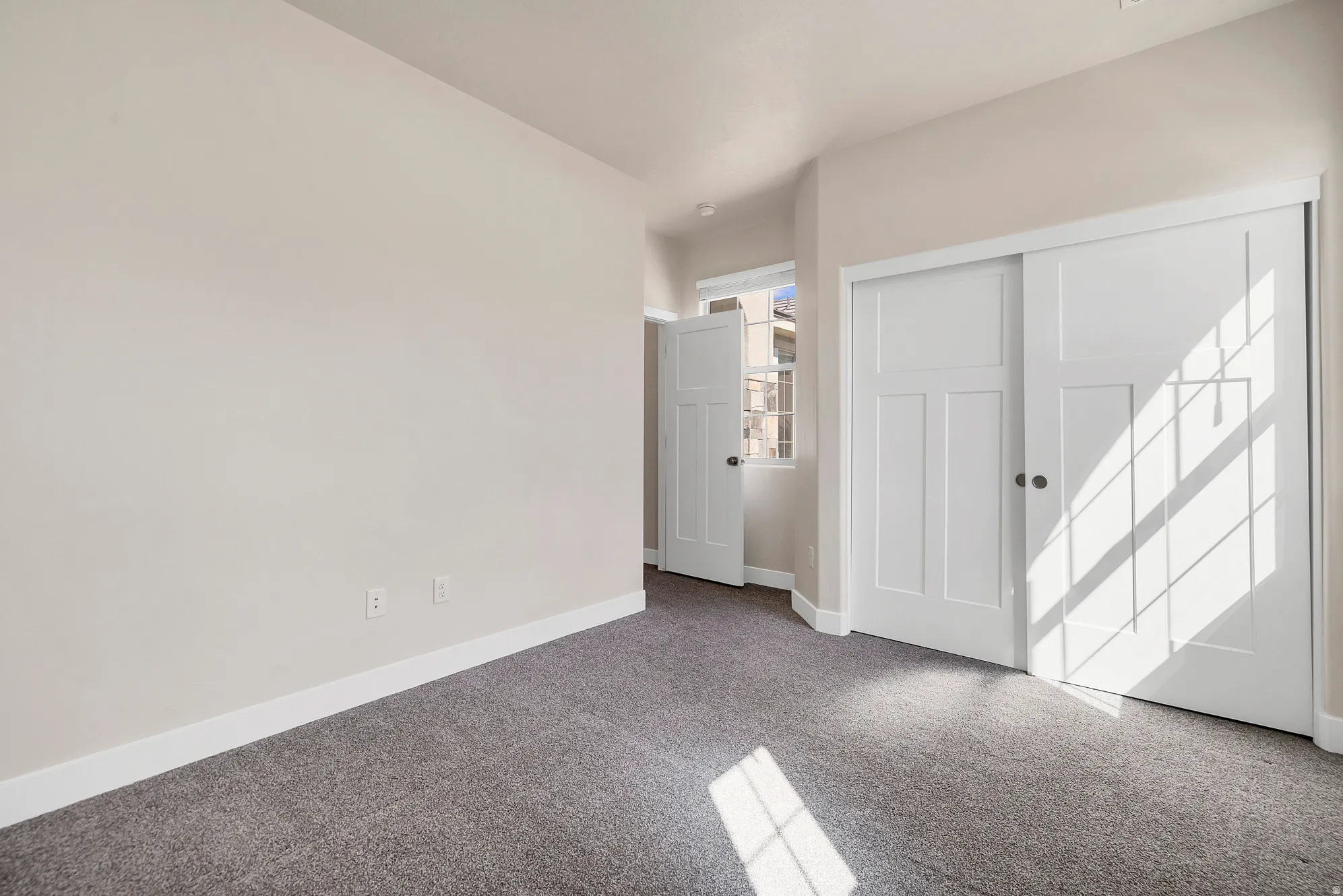 Neutral-toned wall finishes featuring white trim