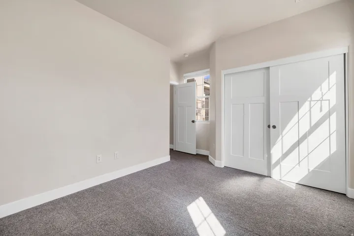 Neutral-toned wall finishes featuring white trim