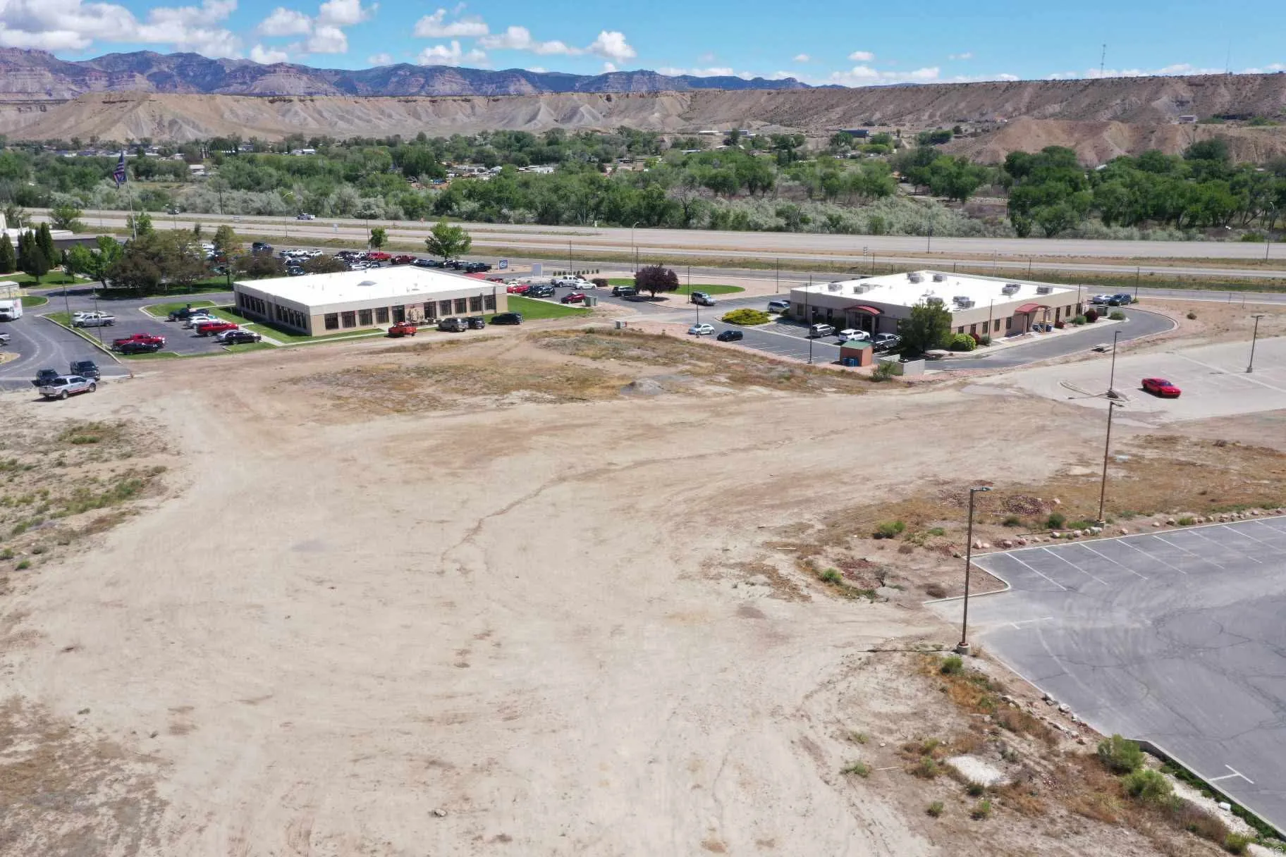 Expansive undeveloped land parcel featuring a flat topography and direct road frontage
