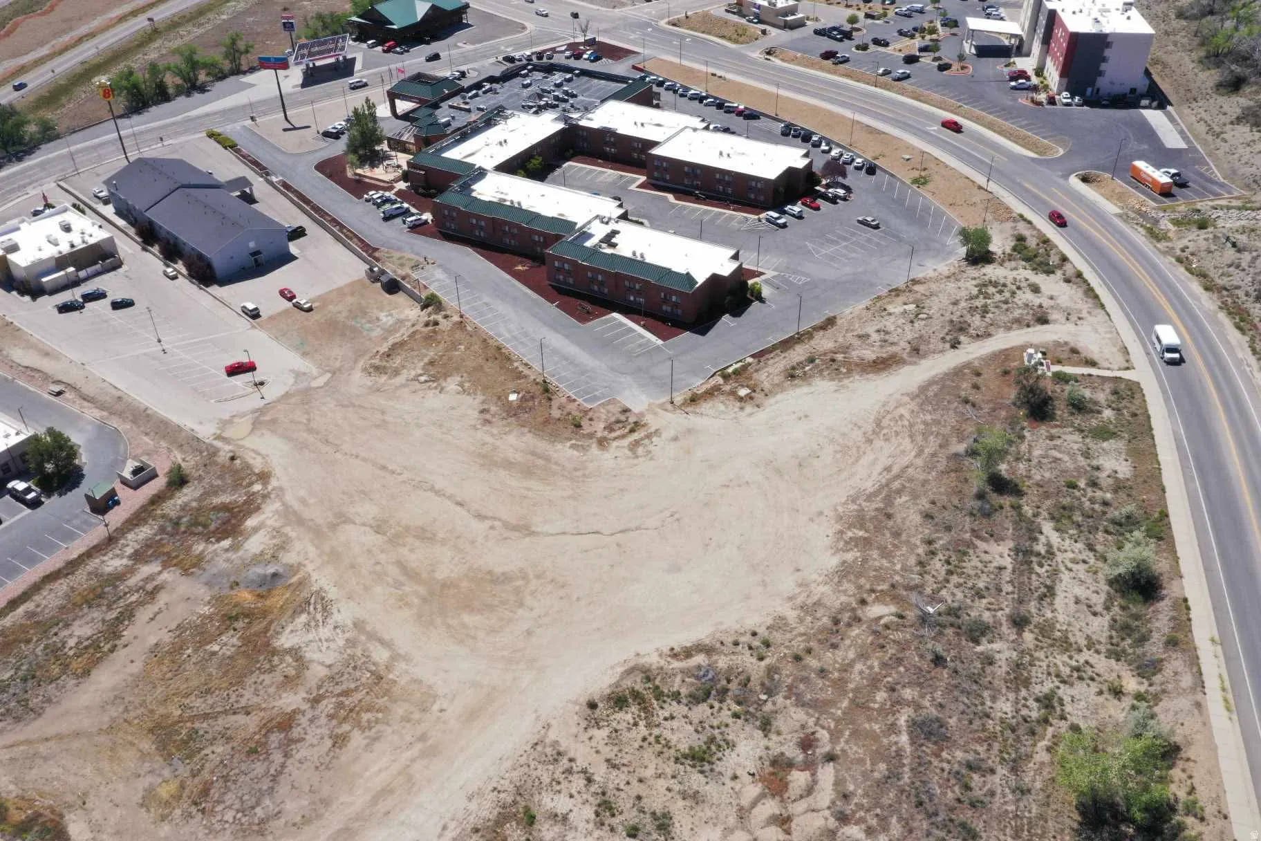 Expansive undeveloped parcel featuring a flat, cleared area