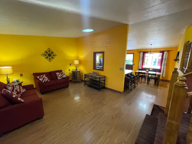 Bright interior with wood-finish flooring throughout