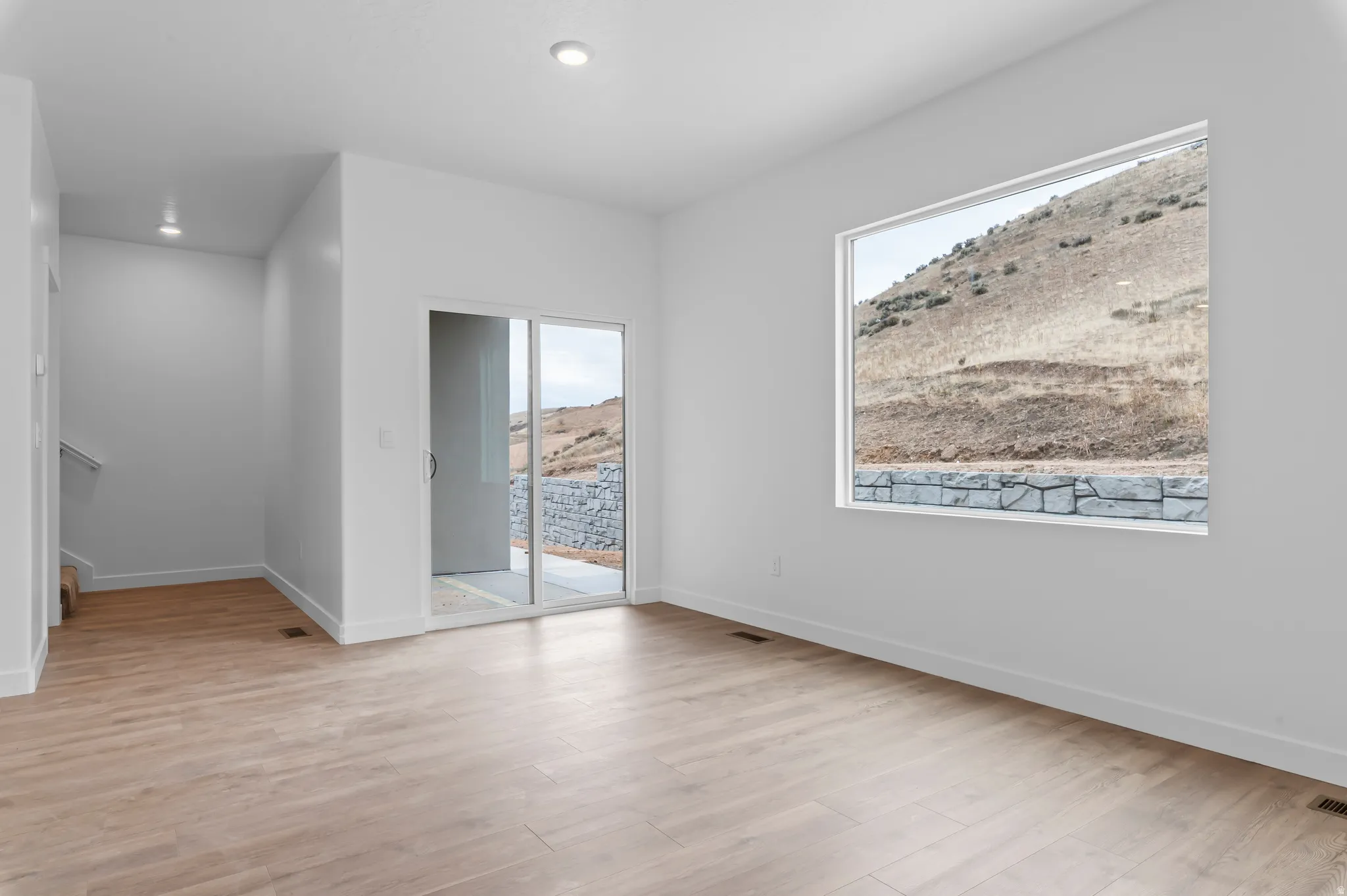 Bright interior with light wood-finish flooring