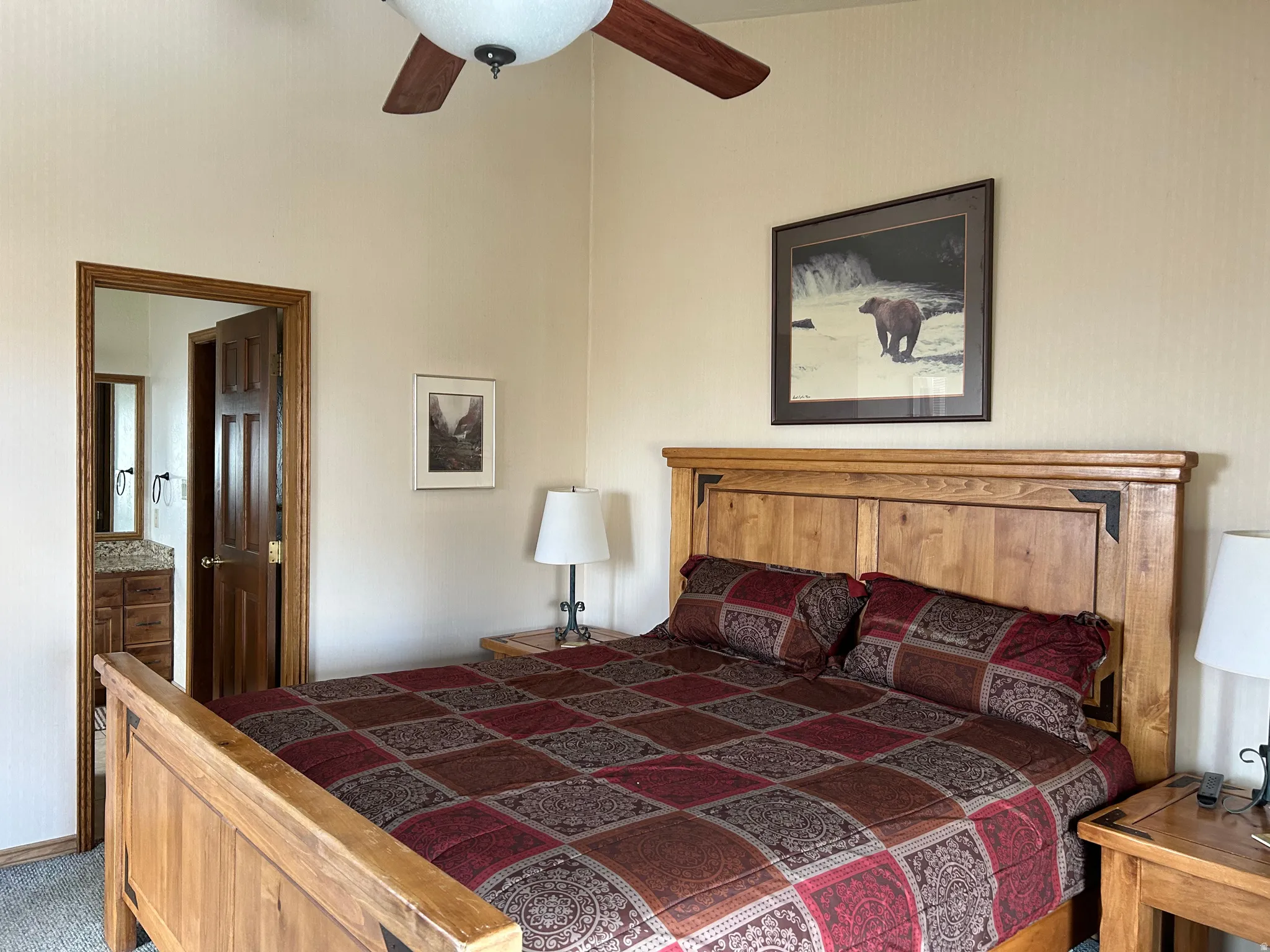 Neutral tone wall finishes paired with textured carpet flooring