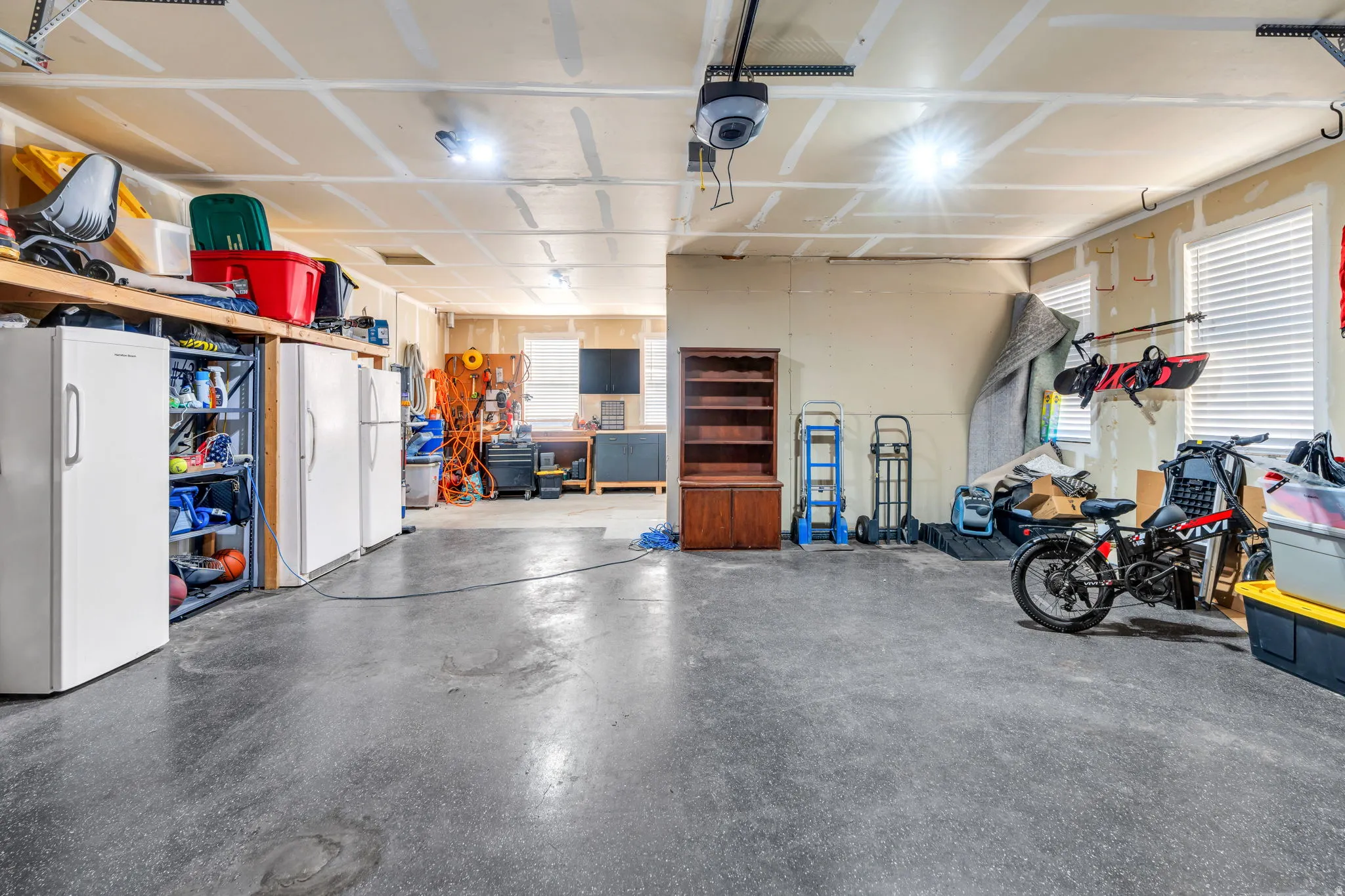 4-car tandem garage with storage space