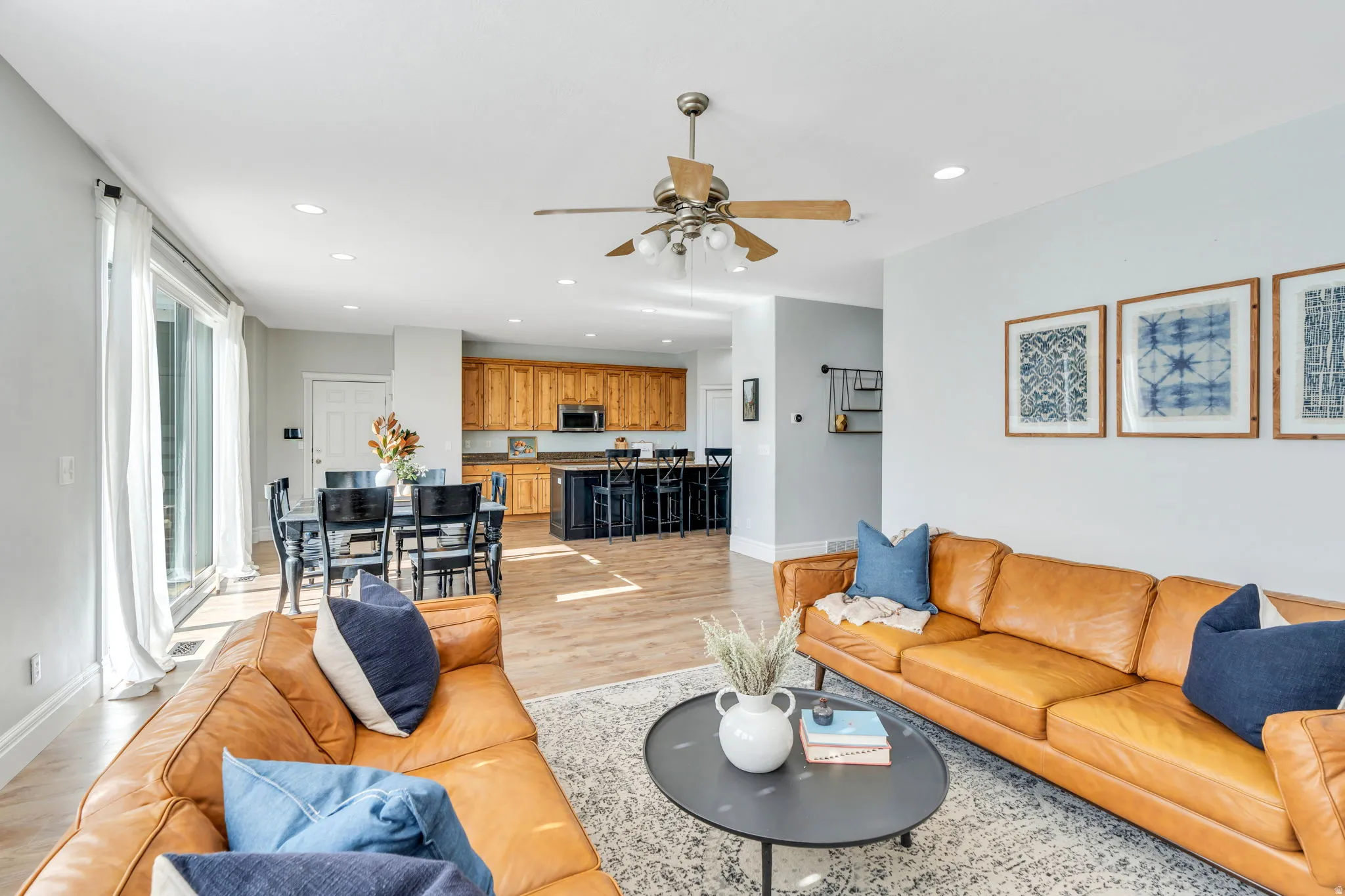 Open space of family room, dining area and kitchen