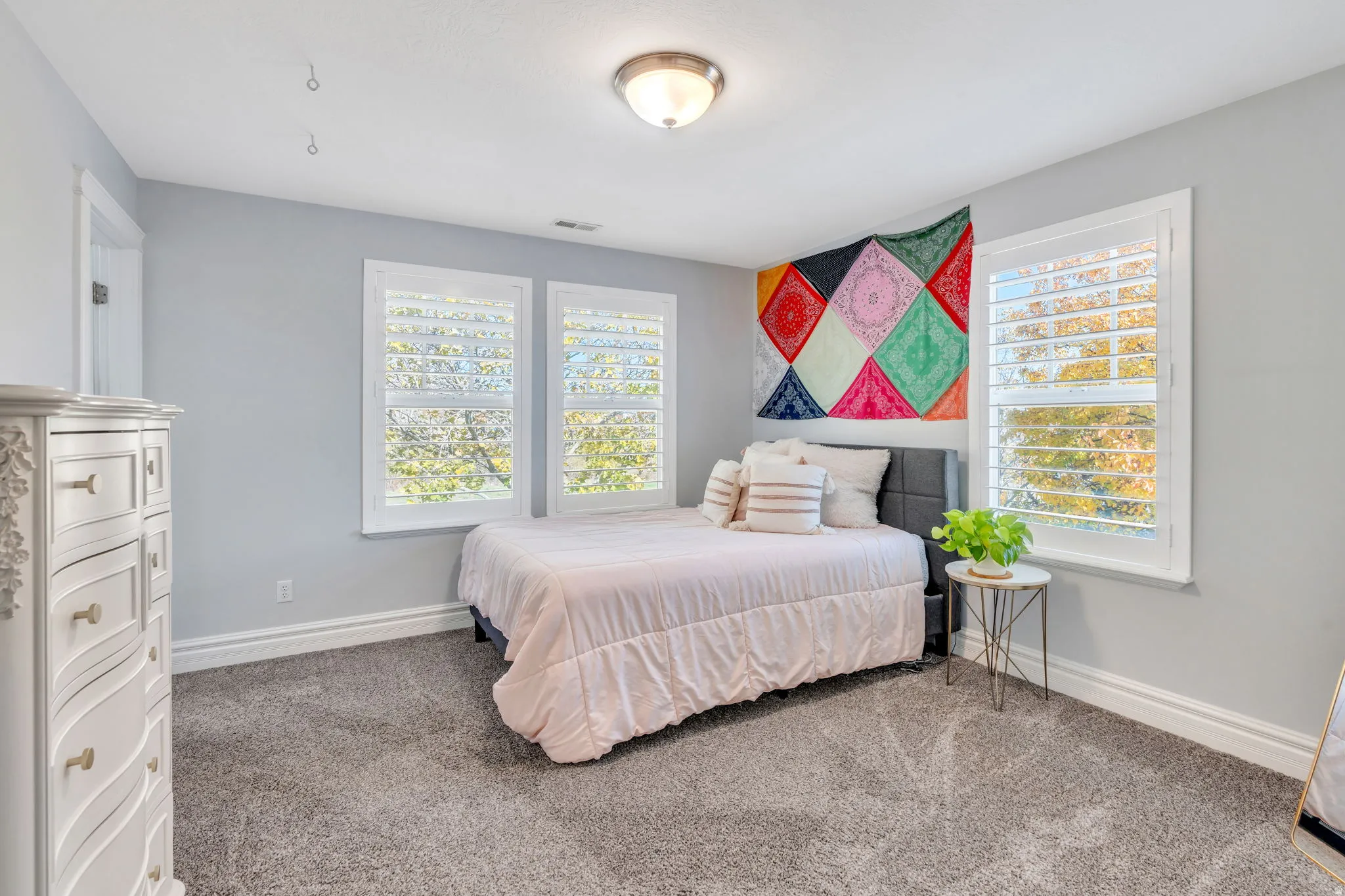 Bedroom with carpeted floors
