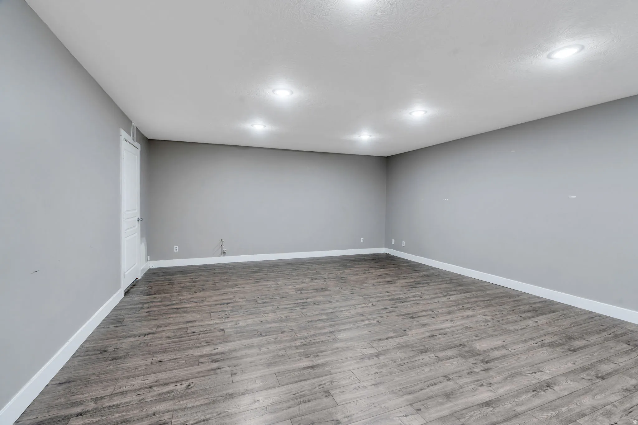 Unfurnished room with light wood-style floors